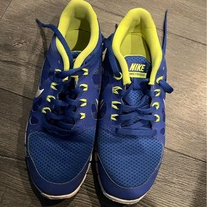 Royal blue and lime green Nike Free 5.0.